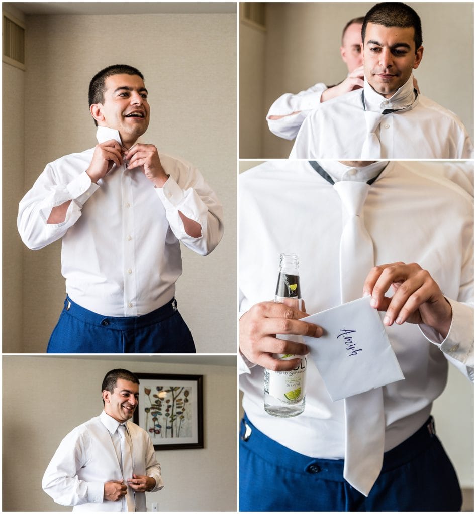 groom getting ready for wedding with a drink and letter from his bride