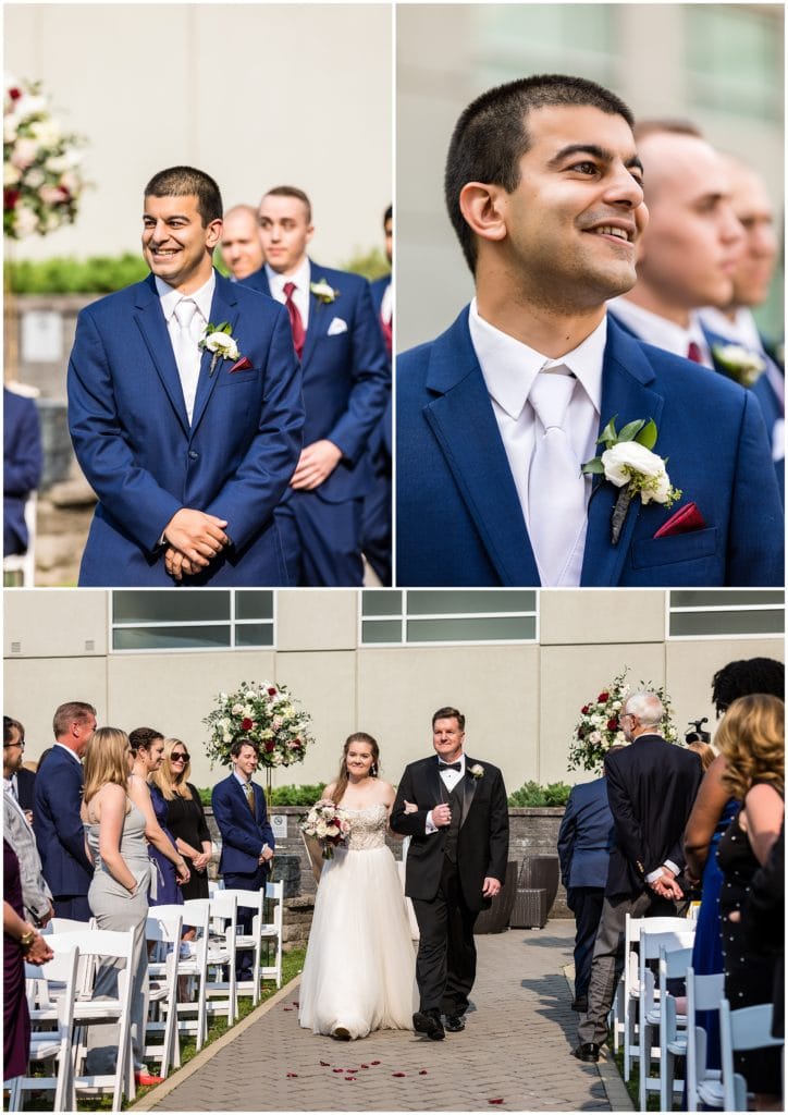 Sheraton Valley Forge wedding ceremony, groom watching bride and father walk down the aisle