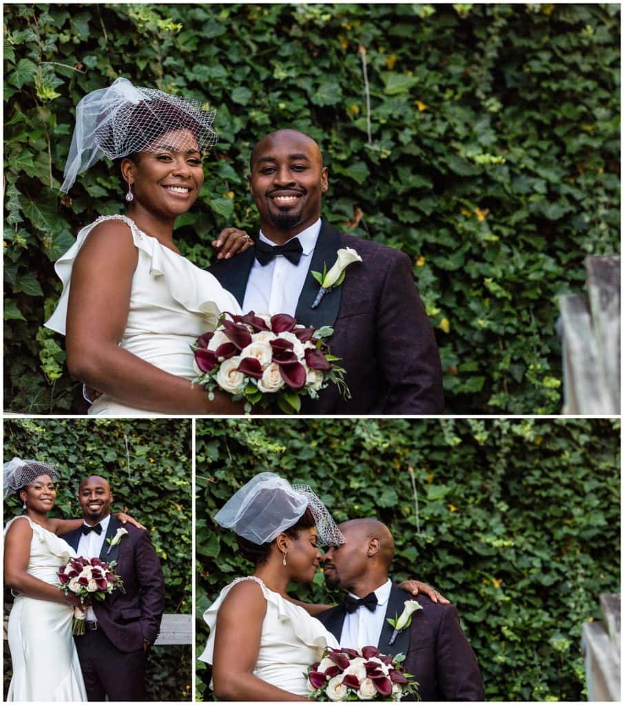 Bride and groom wedding portraits with maroon and white bouquet in front of ivy wall