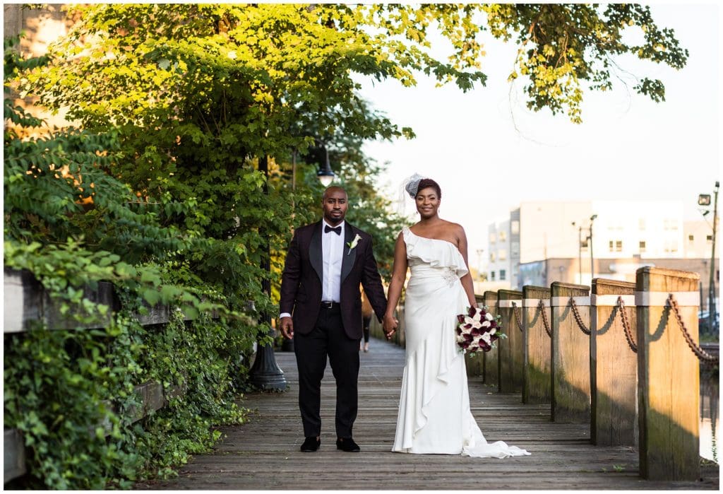 Intimate bride and groom portraits under Manayunk bridge