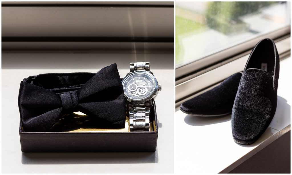 Groom wedding day accessories of shoes, bowtie, and watch