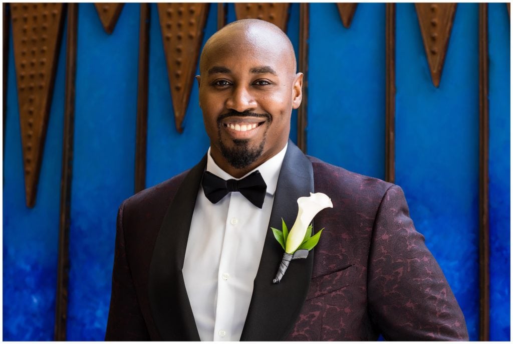 Traditional groom portrait with unique patterned tuxedo