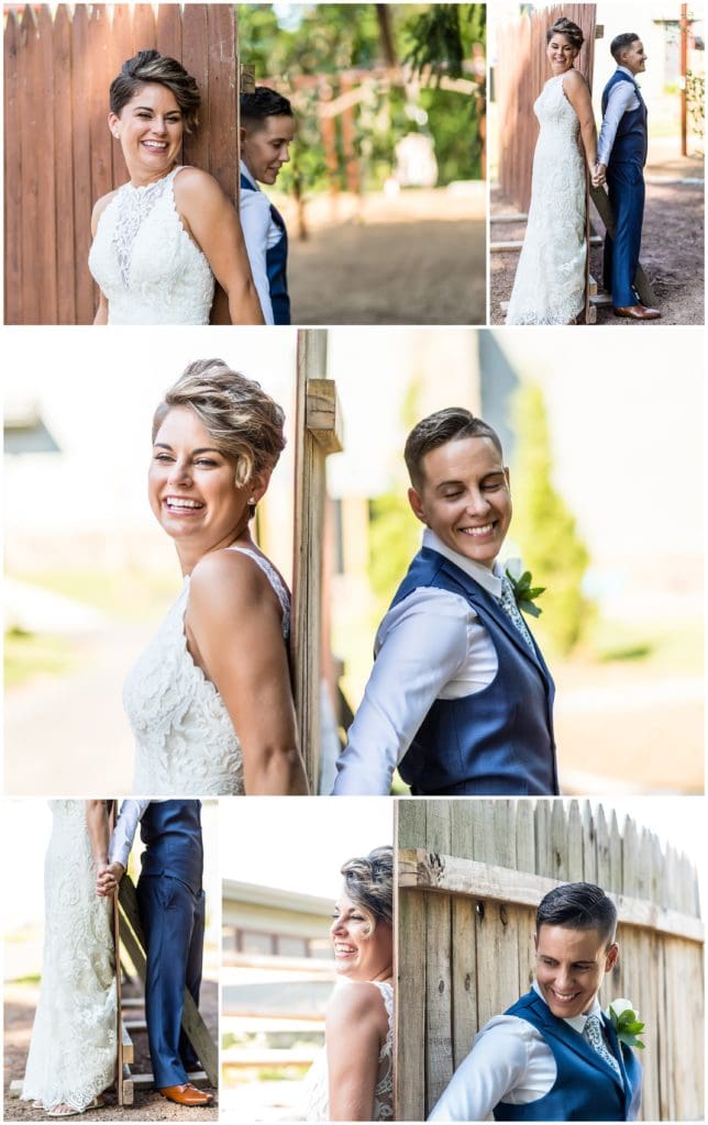 First look between LGBT couple standing back to back behind a fence