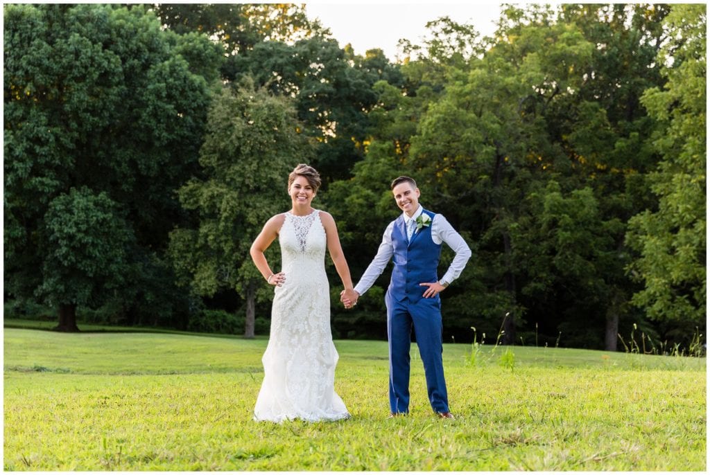 Traditional outdoor wedding portrait with LGBT brides