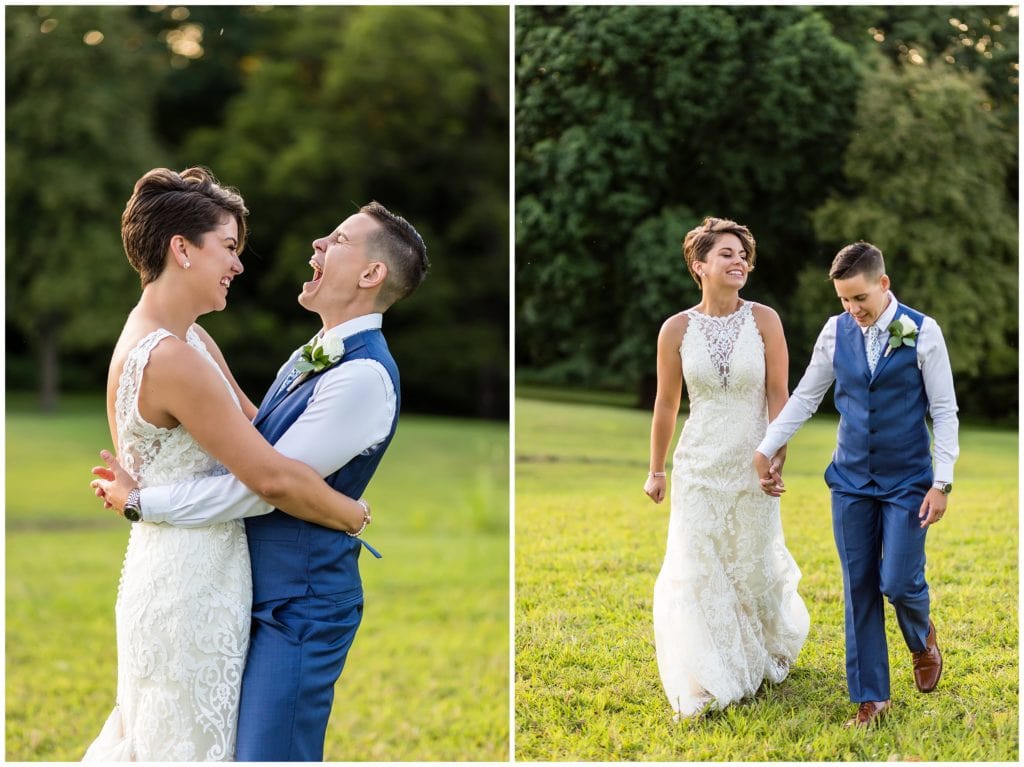 Traditional outdoor wedding portrait with LGBT brides laughing and holding hands