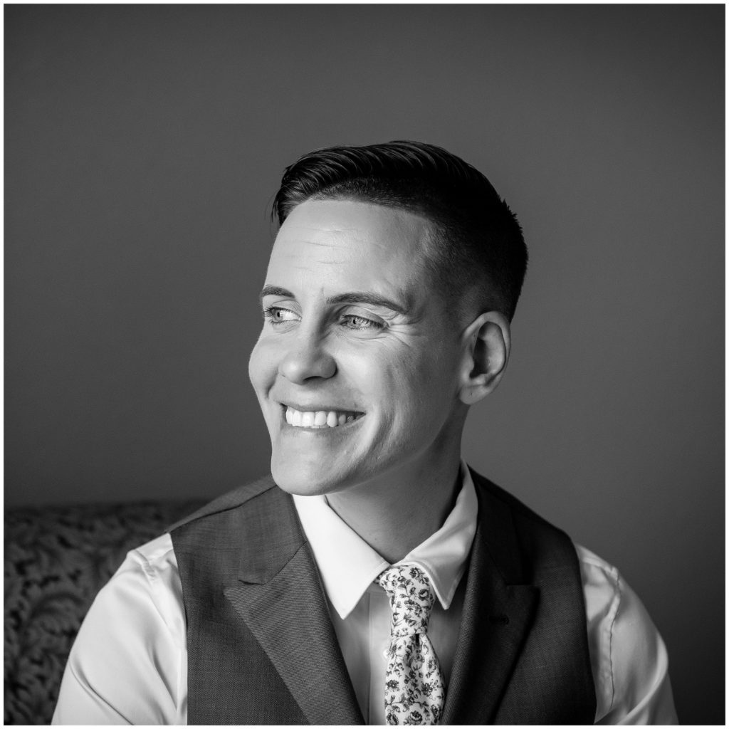 Traditional Black and White window lit bridal portrait with LGBT bride