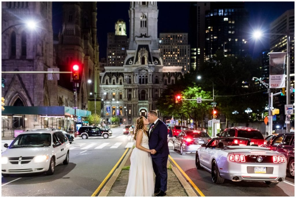 Bride and groom wedding night portrait on Broad Street in front of Philadelphia City Hall