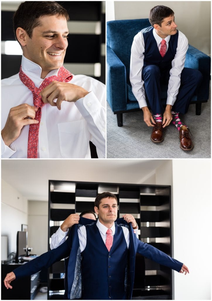 Groom getting ready with unique tie and socks before wedding