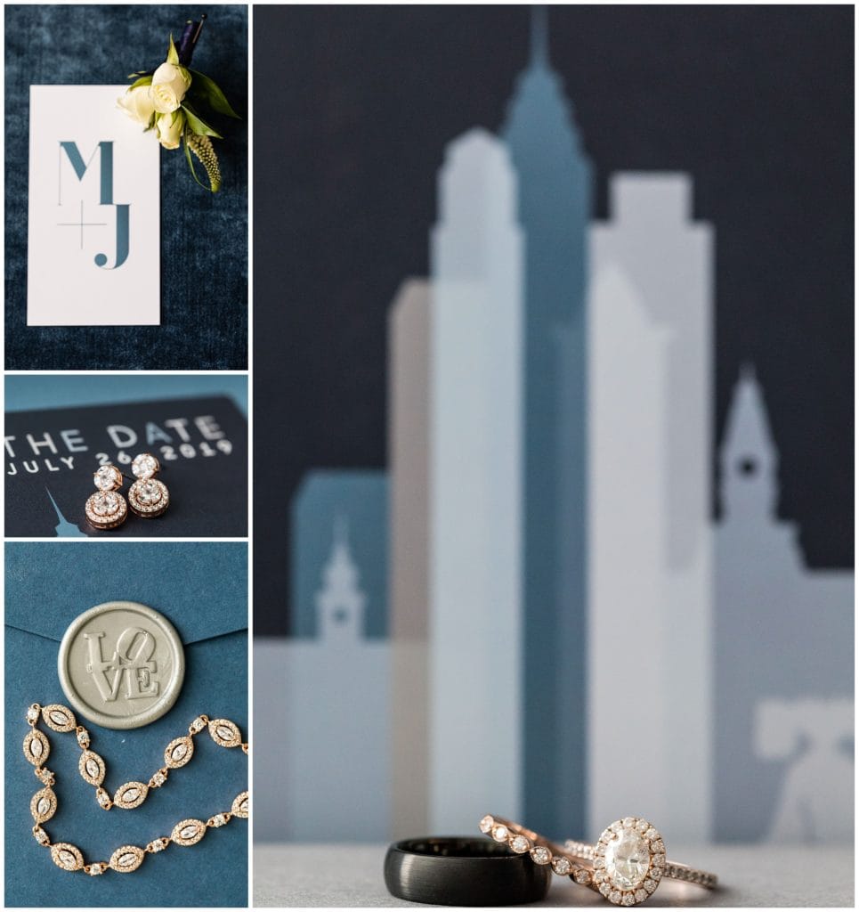 Philadelphia wedding invitation suite with skyscrapers, LOVE stamp, florals, and wedding rings for Tendenza Wedding