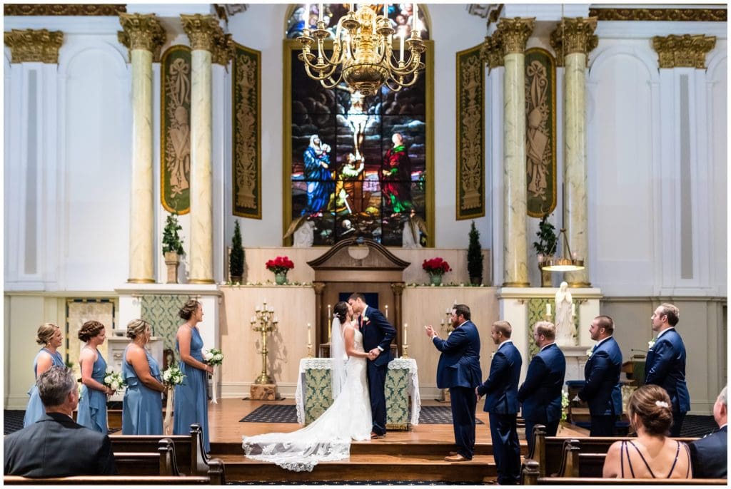 First kiss as husband and wife in Old St. Mary's Church wedding ceremony