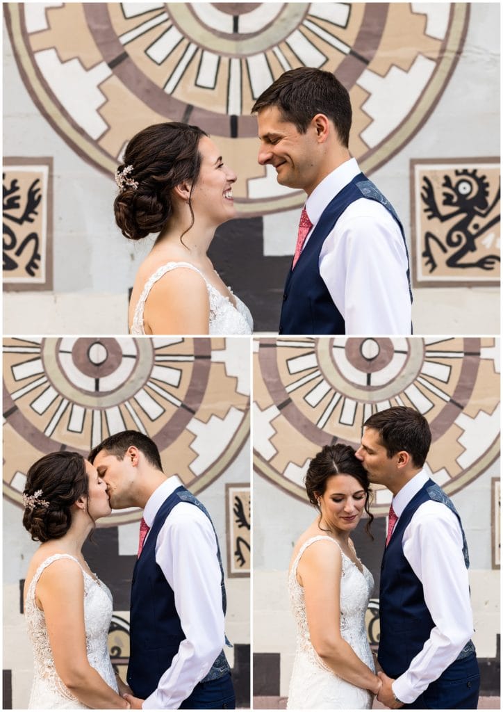 romantic wedding portraits bride and groom share kisses
