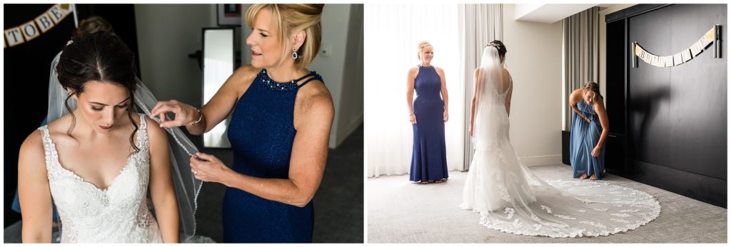 Mother and sister of the bride perfecting her gown and veil