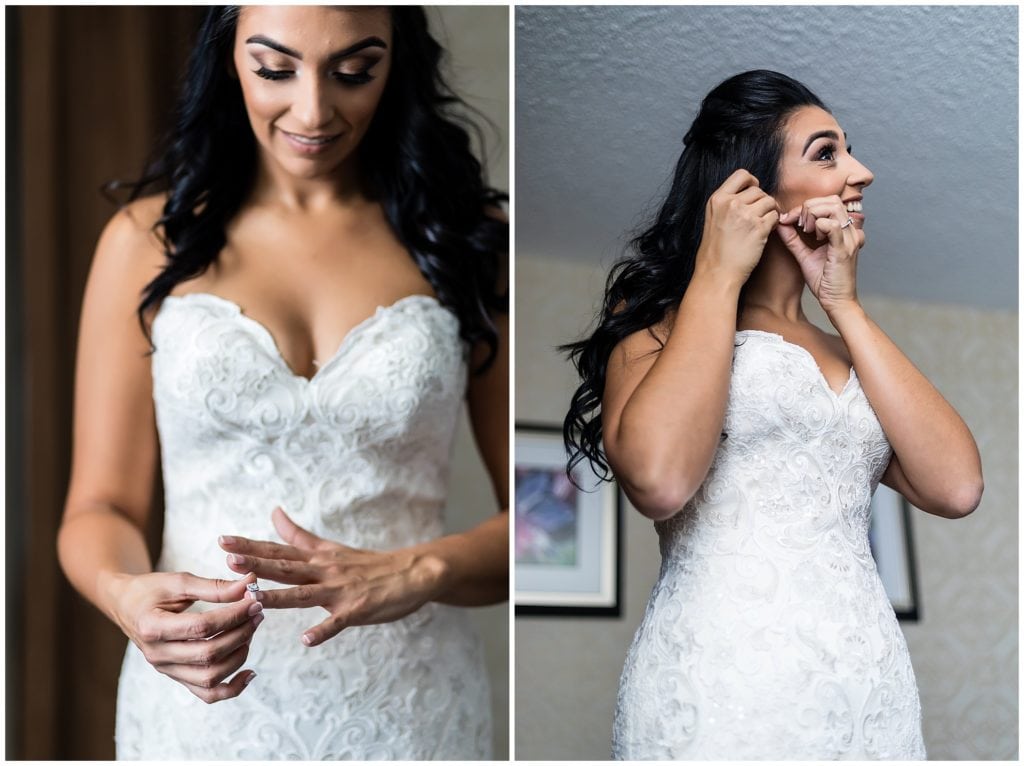 Window lit bridal portraits of bride putting on engagement ring and earrings