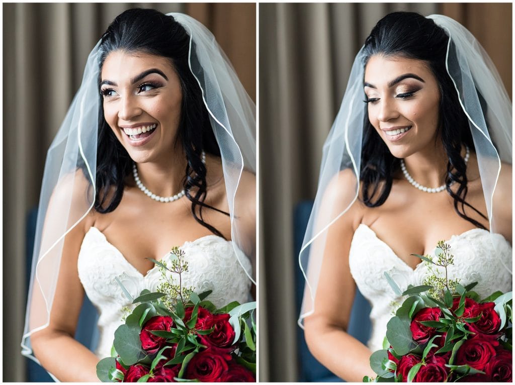 Traditional window lit bridal portrait with red rose bridal bouquet