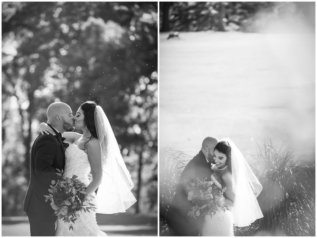 Black and white wedding portraits of bride and groom kissing and snuggling