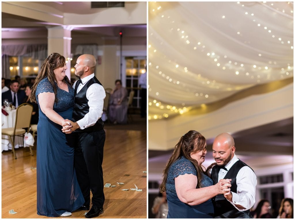 Mother of groom and groom dance during parent dances at wedding reception