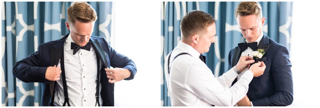 Groom putting on his jacket and getting help pinning his boutonniere