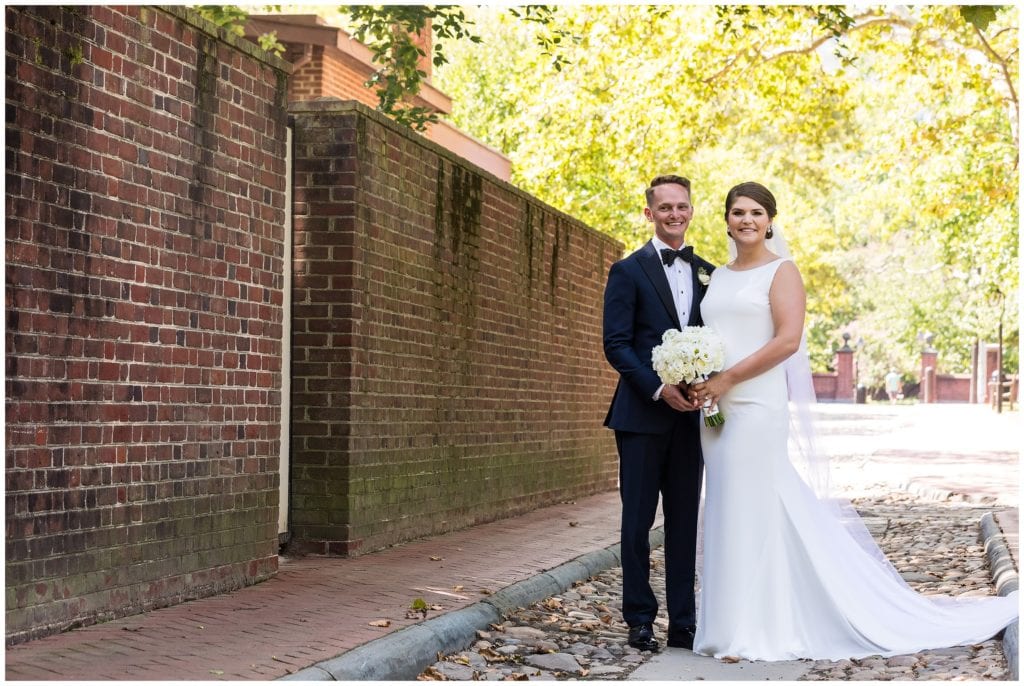 Traditional bride and groom portrait on cobblestone street in Old City Philadelphia