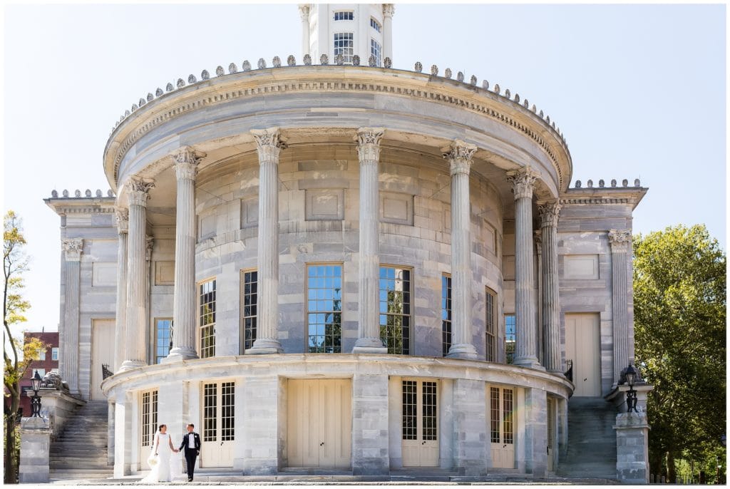 Bride and groom portrait in front of Merchant Exchange Building