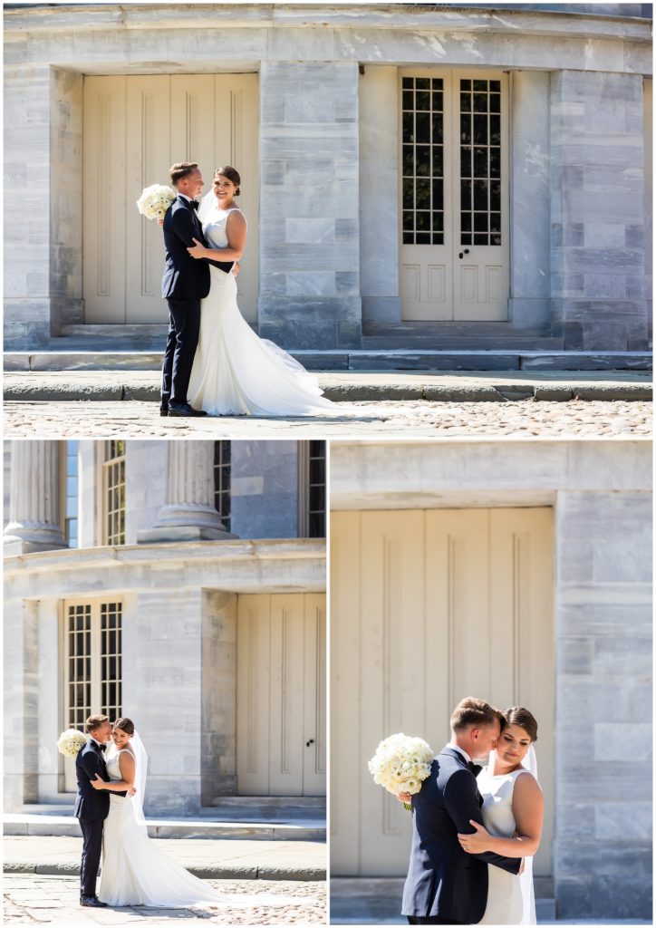 Bride and groom snuggling up for portraits in front of Merchant Exchange Building