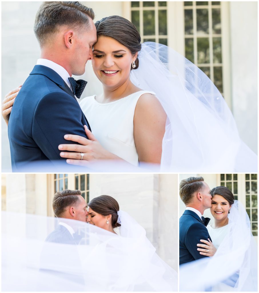 Bride and groom portrait with long veil flowing in the wind in Old City Philadelphia