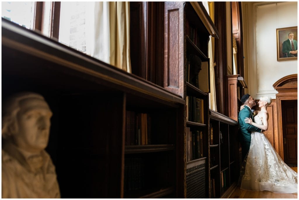 dramatic couples portrait inside the college of physician - best philadelphia wedding venues