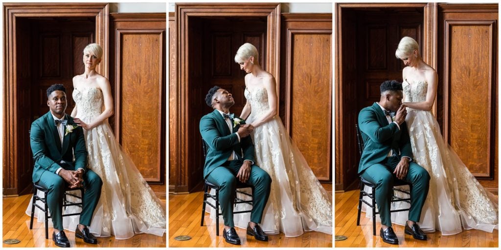 Dramatic bride and groom portraits with groom sitting and kissing brides hand