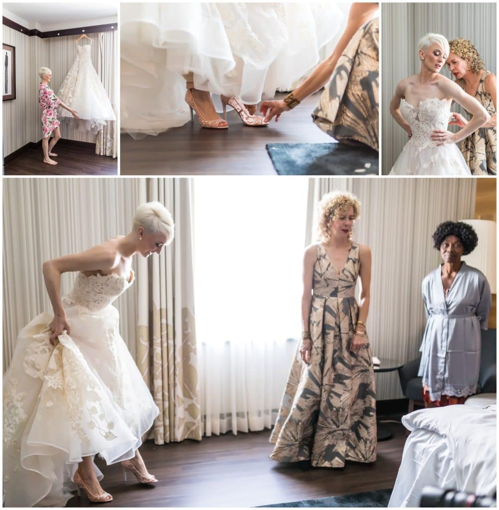 Bride putting on her wedding dress and shoes with the help of her mother