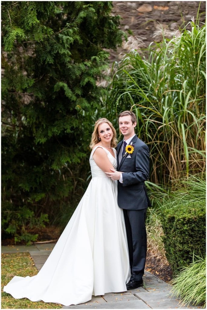 Traditional bride and groom portrait in gardens at the Michener Museum