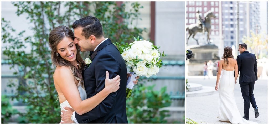 Bride and groom hugging and walking through Philadelphia City Hall