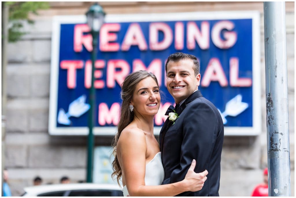 Traditional bride and groom portrait outside Reading Terminal Market