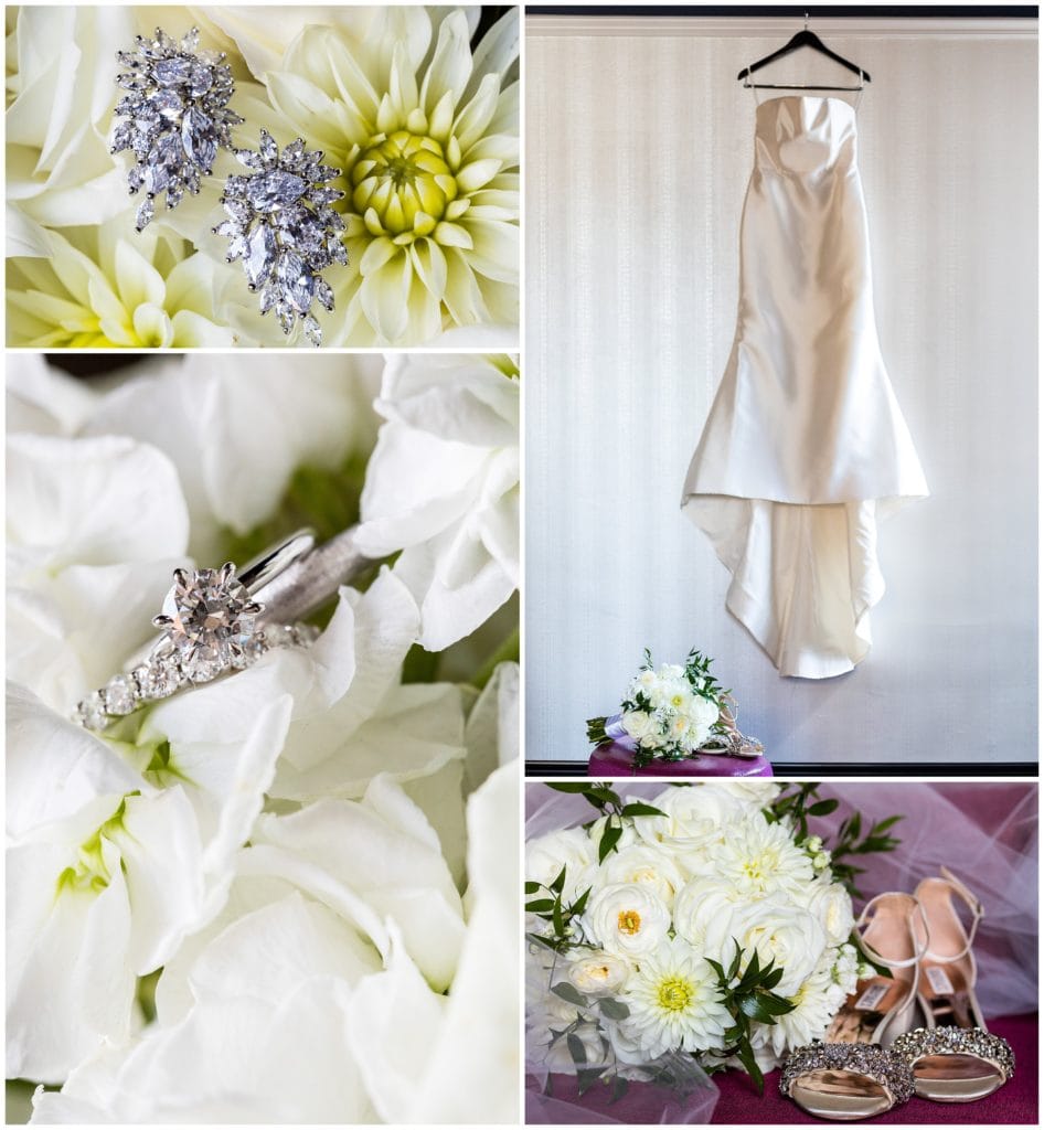 Elegant bridal details, wedding gown hanging with bouquet, wedding rings, earrings, and shoes with bouquet