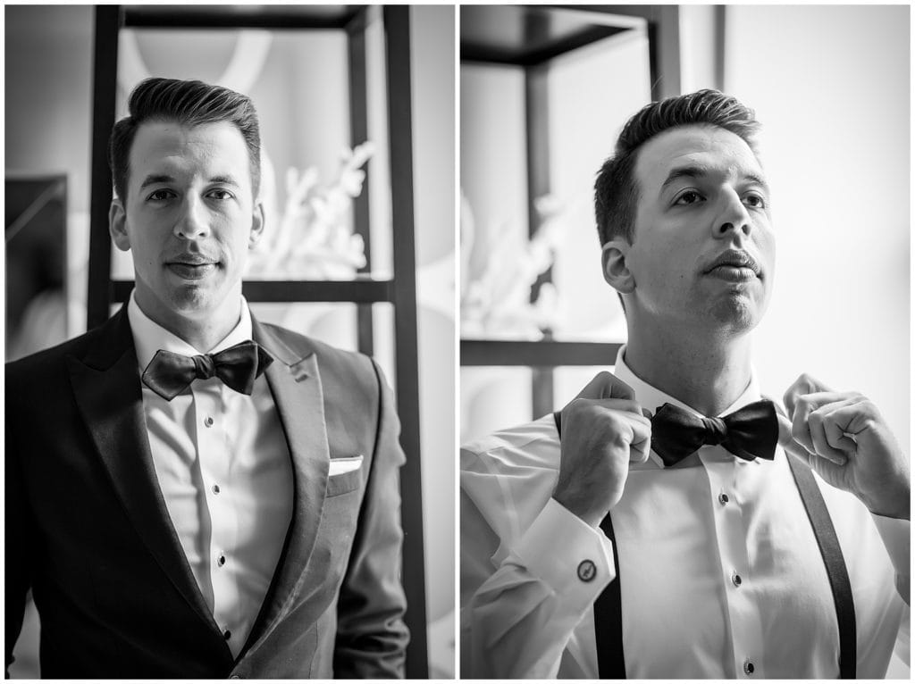 Black and white, traditional window lit groom portraits with groom fixing his bowtie