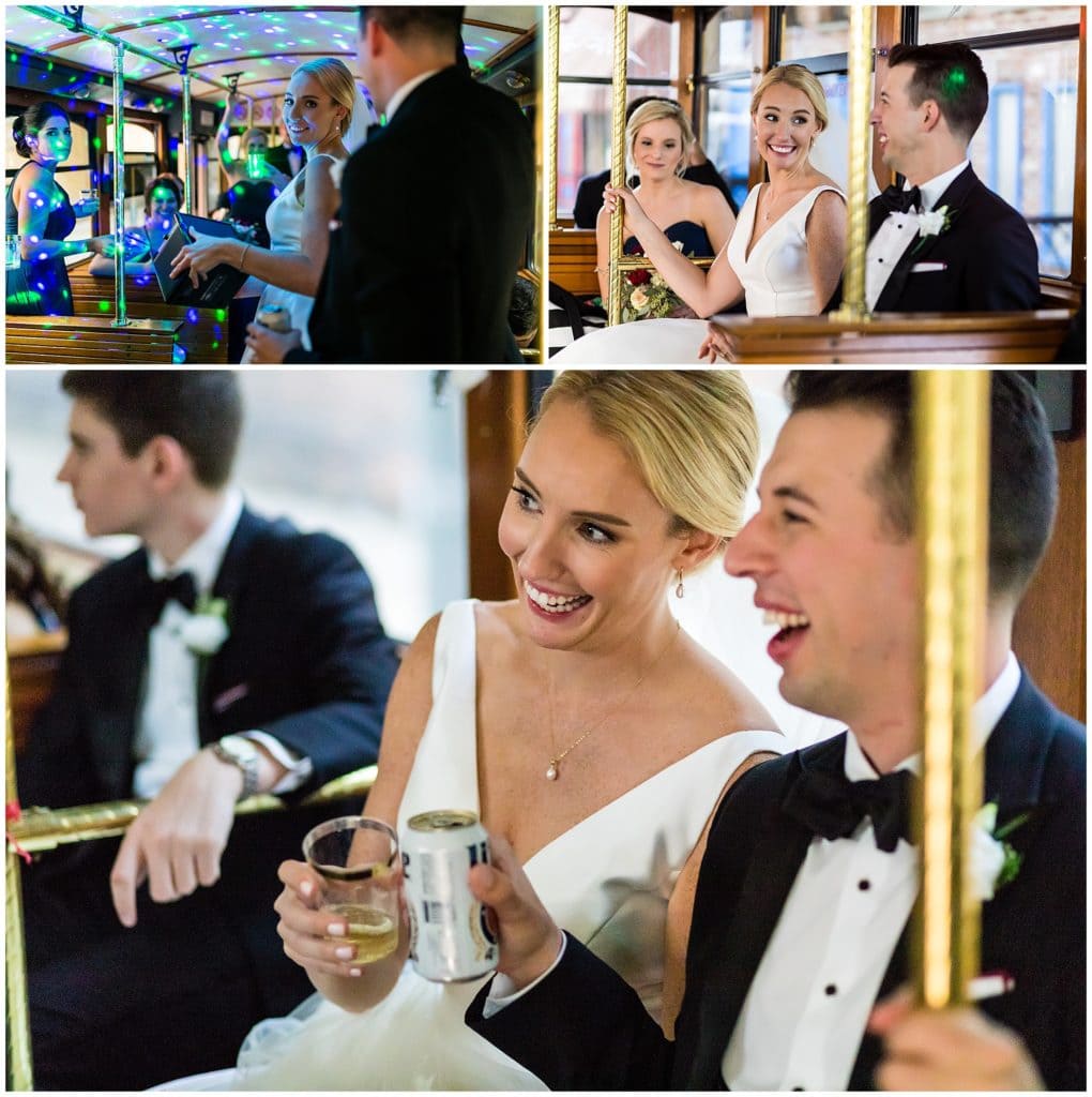 Bride and groom having beer and champagne on trolley after wedding, party lights on wedding trolley