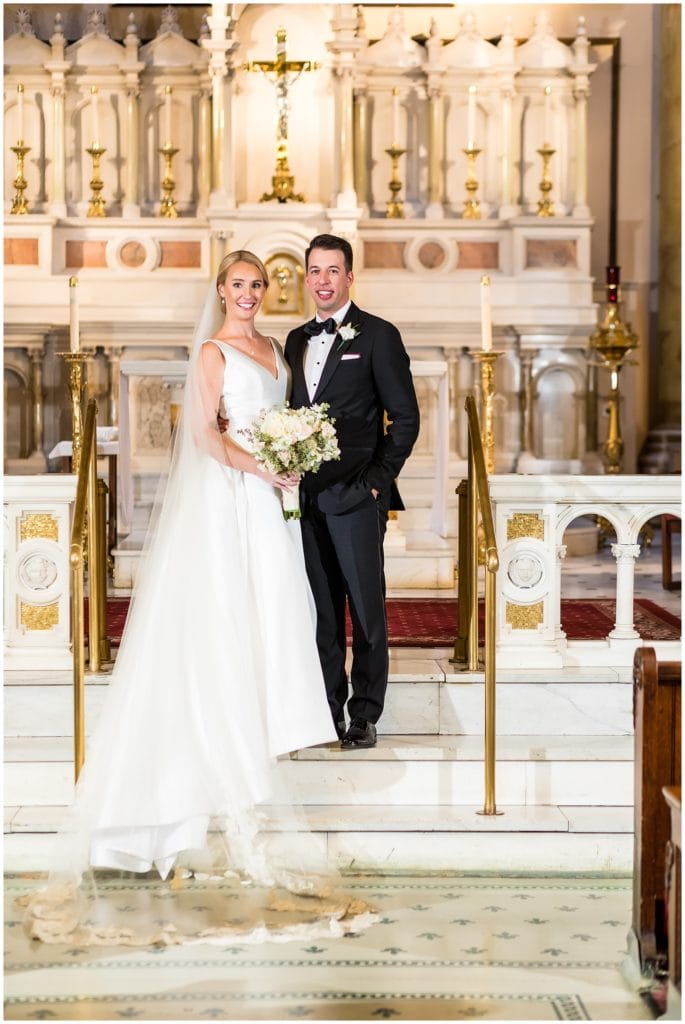 Traditional bride and groom wedding portrait inside St. Augustine Catholic Church in Philadelphia