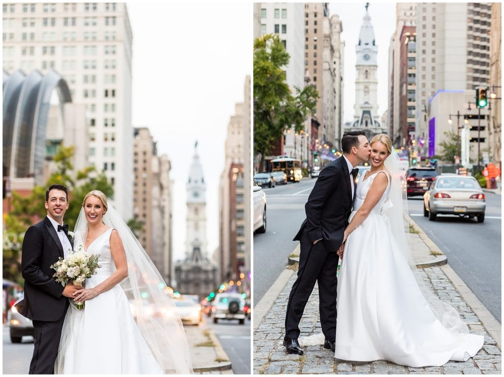 Bride and groom kissing on Broad Street Philadelphia