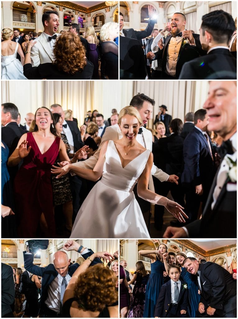 Bride, groom, and guests party on the dance floor at Ballroom at the Ben wedding reception