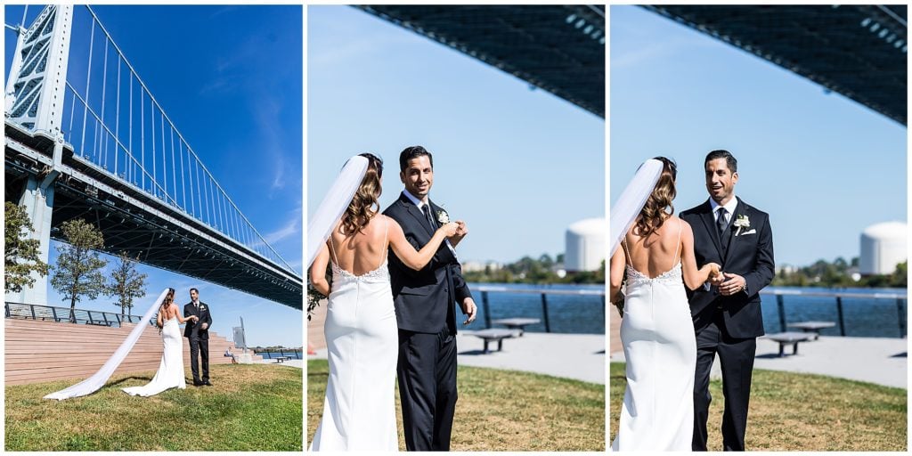 Groom turning around and seeing bride for the first time first look at Race Street Pier Philadelphia