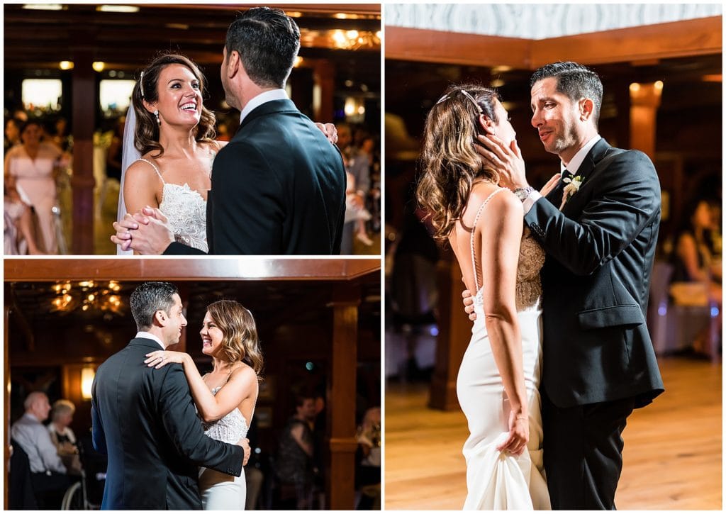 Bride and groom smile and admire each other during intimate first dance at Moshulu wedding reception