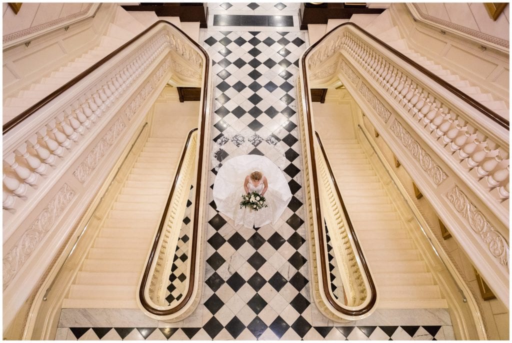 overhead view of bride on the marble checkerboard floor at One North Broad - Best Philadelphia Wedding Venues