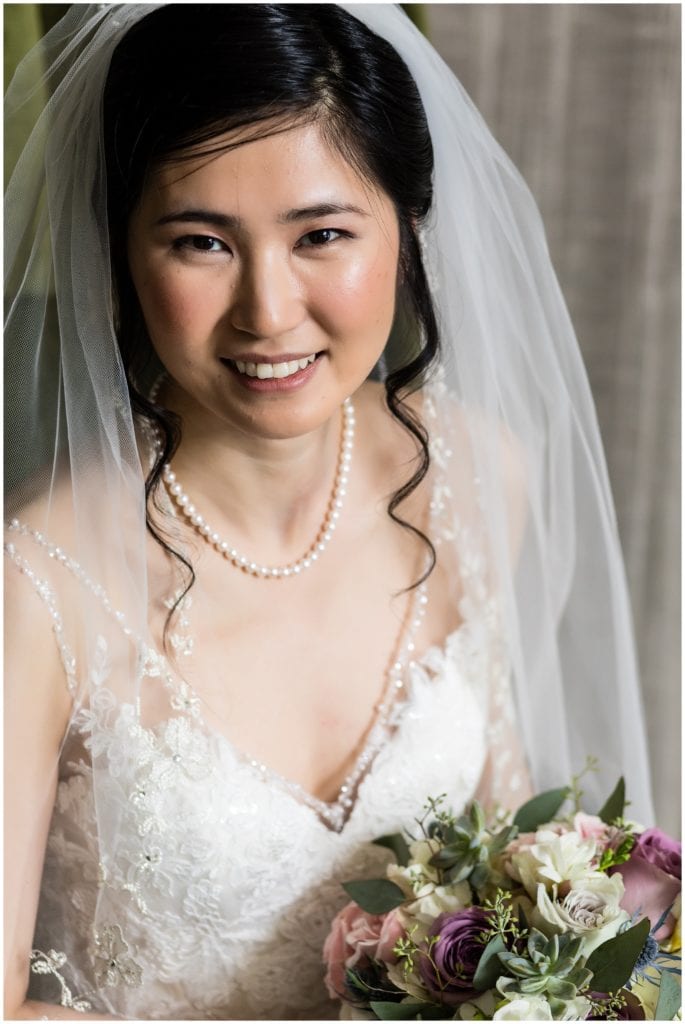 Traditional window lit bridal portrait