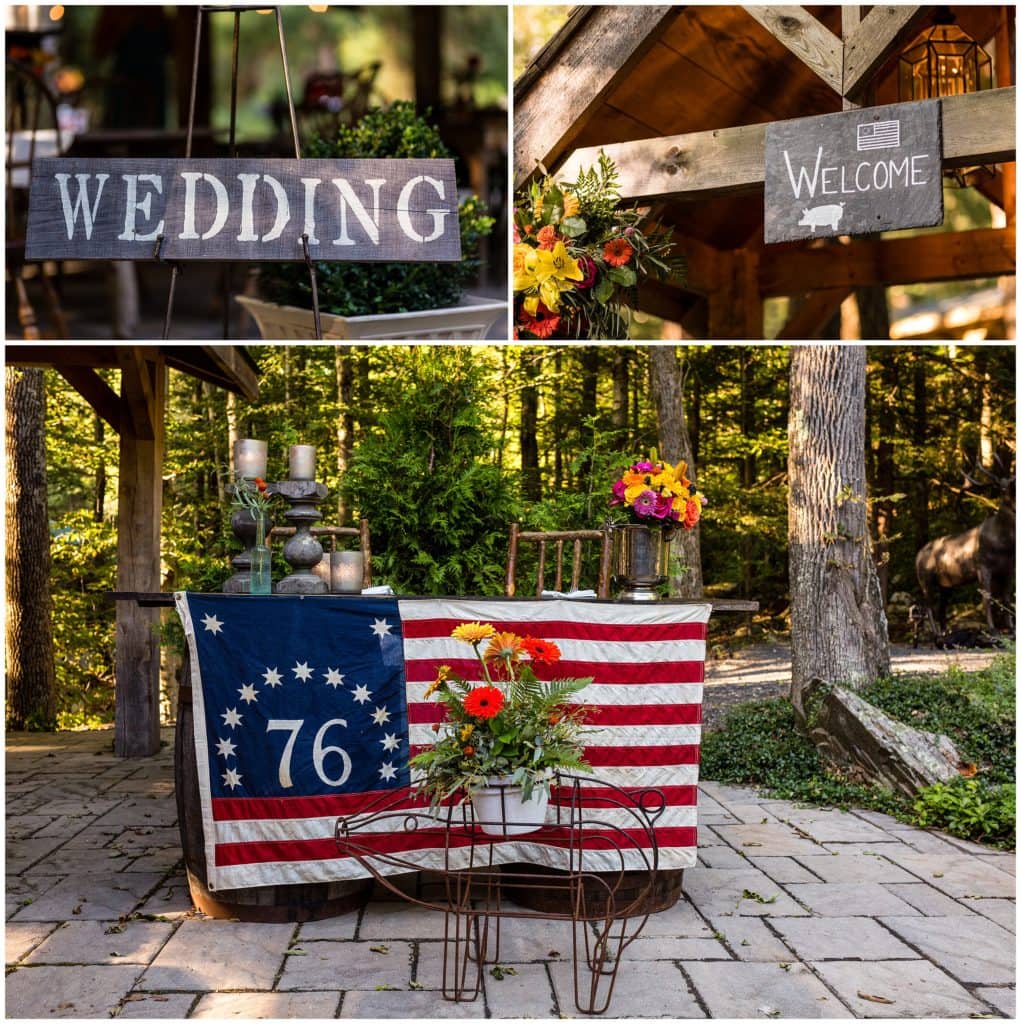 Wedding welcome signs with pigs an American flag on sweetheart table