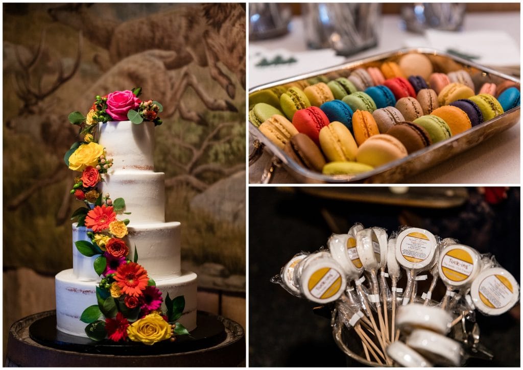 Wedding reception details with bright floral wedding cake, colorful macaroons, and s'mores