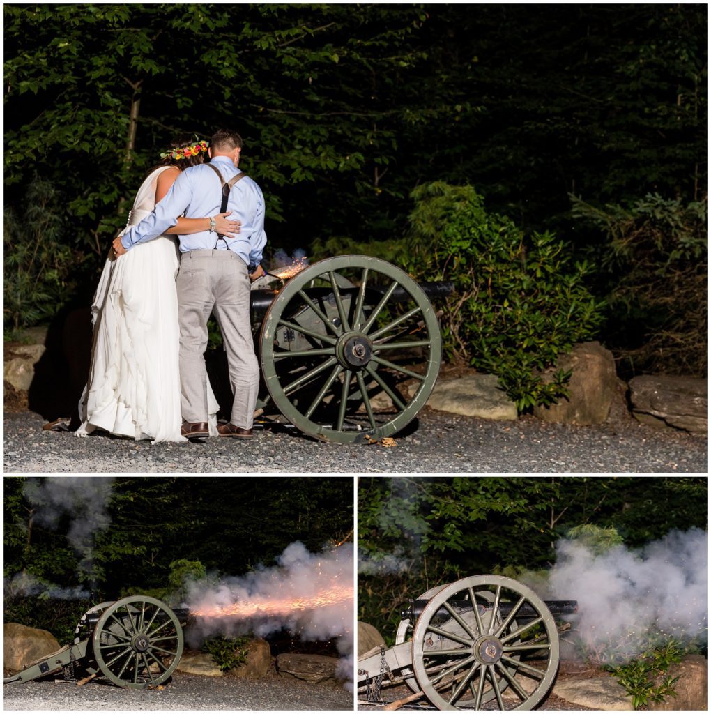 Bride and groom lighting canon together during outdoor barn woods wedding reception