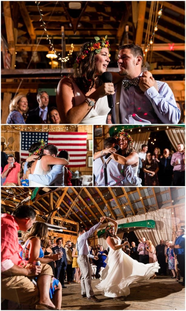 Bride and groom sing and spin around on the dance floor inside barn wedding reception