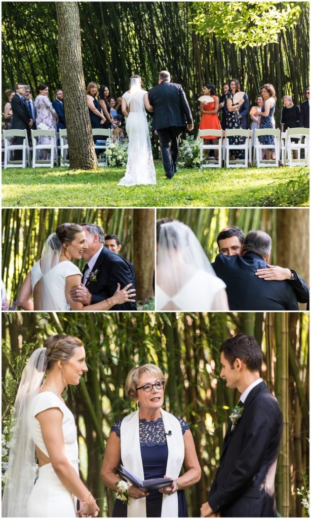 Bride and her father walking down the aisle and hugging her and the groom at outdoor Old Mill wedding ceremony