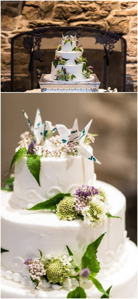 Wedding cake with hand made paper crane wedding toppers and purple and green florals