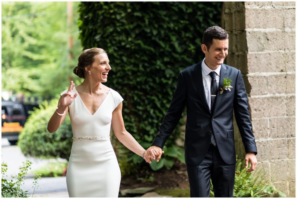 Bride and groom making entrance at Old Mill wedding reception