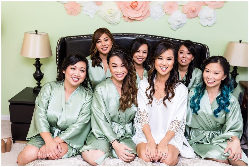 Bride and bridesmaids with matching mint silk robes