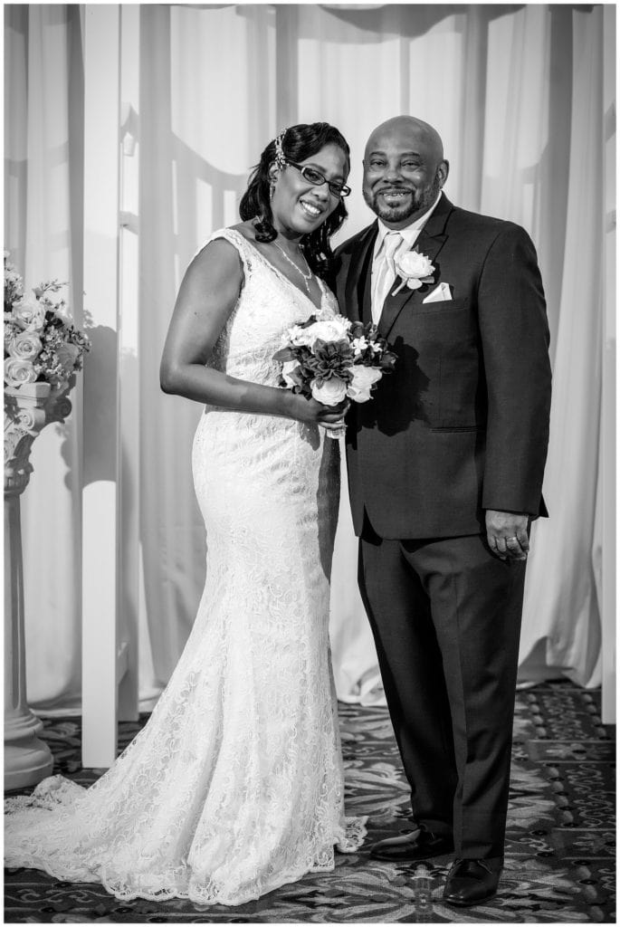 traditional portrait of bride and groom on their wedding day